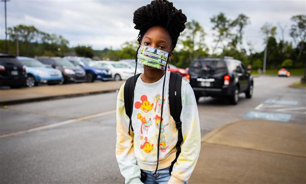 student smiles on first day of school